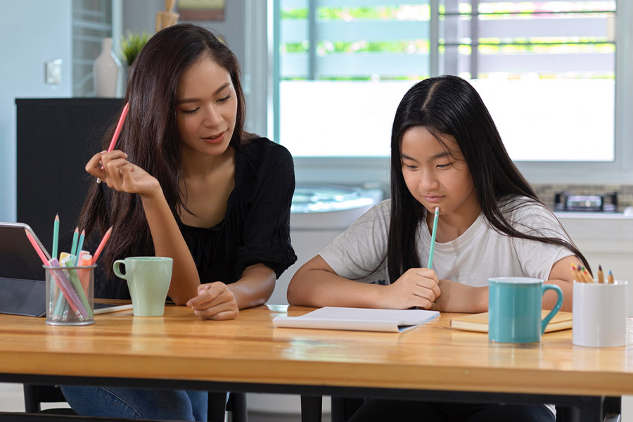 student and tutor together at a desk in Dayton